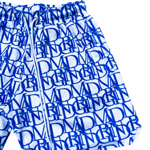 Load image into Gallery viewer, Zoomed front view of our D&#39;PAT Hoops Shorts featuring the MADGRIND brand name as its main design.