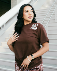 Our model wearing and representing our Monogram Logo Tee (Brown).