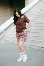 Load image into Gallery viewer, Our model wearing and representing our Monogram Logo Tee Brown combined with our Monogram Pattern Shorts (Brown) including the MADGRIND iconic socks.